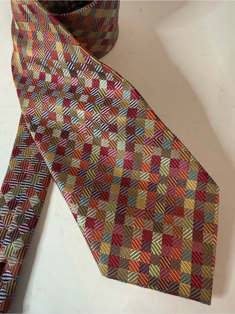 Multicolor Geometric Silk Tie — Vibrant Red & Gold Pattern
